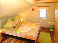 Ein Schlafraum in der Wohnung Pfaffenstein - Bild 9: Landhaus Rundblick im Elbsandsteingebirge + Panoramablick