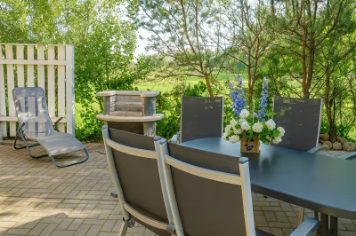 Ferienwohnung in Wiek auf Rügen: Fewo am Wieker Bodden 80m zum Wasser, Terrasse, Balkon, Garten, Fahrräder