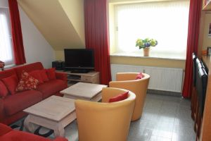 Wohnzimmer mit Schlafsofa