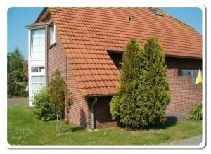 Ferienhaus in Dornum: Doppelhaushälfte in ruhiger Sackgassenlage im Küstenbadeort Neßmersiel