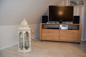 Für die Unterhaltung ist ein TV,DVD/Blue-Ray-Player u.eine Musikanlage vorhanden