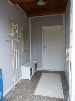 im separaten Eingangsbereich finden Hut und Mantel ihren Platz
