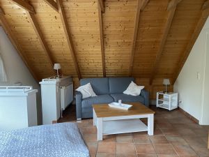 Schlafcouch und Sitzgelegenheit