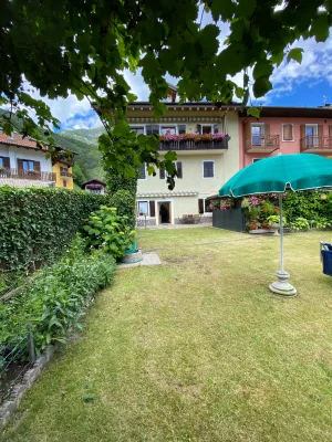 Bild 4: hundefreundliche Fewo Nina mit eigenem eingez. Garten+Pool am Ledrosee