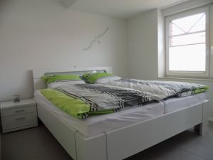 Das Schlafzimmer Das gemütliche Doppelbett im Schlafzimmer. Auch hier befindet sich eine Fußbodenheizung