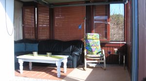 Wintergarten Der Wintergarten ist direkt an die Terrasse angeschlossen und bietet bei jedem Wetter eine tolle zusätzliche Sitzgelegenheit. Natürlich auch mit Blick auf das Meer.