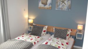 Schlafzimmer 2 Hier das eine der beiden Schlafzimmer. Beide haben ein 180er Doppelbett. In einem Schlafzimmer befindet sich ein weiterer TV.