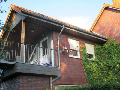 Luftkurort Werdum: Dachgeschoss-Fewo STEUERMANN mit Balkon und Garten