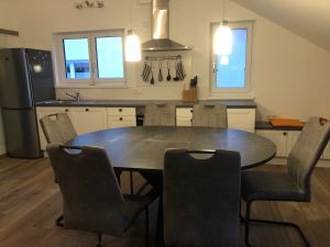 ...um gemütlich zusammen zu essen, zu reden oder Spiele zu spielen.