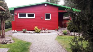 Bild 1: Ferienhaus am Malchiner See mit Motorboot und Kanu