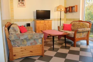 Bild 1: Landhaus am Teich - Ferienwohnung rot - Saaler Bodden - Ostsee