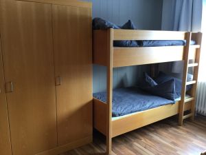 Etagenbett Im Familienschlafzimmer befindet sich ein Etagenbett für Ihre Kinder und ein geräumiger Kleiderschrank