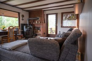 Wohnlandschaft,Essecke ausziehbarer Tisch,TV,Kamin