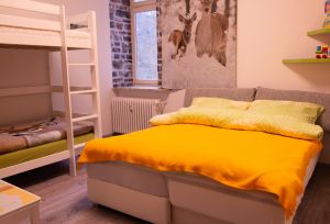 ein hochwertiges Schlafsofa mit Extratopper bietet eine durchgehende Liegefläche von 1,40 x 2 Meter