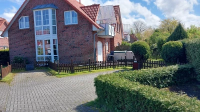 Ferienwohnung in Norden: Ferienwohnung "Nordseeradler" - EG-Wohnung mit sehr großem Garten