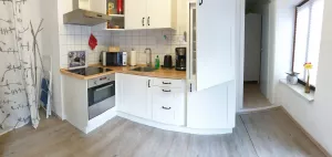 die Wohnküche Betritt man die Wohnung kommt man gleich in die gut ausgestattete Wohnküche